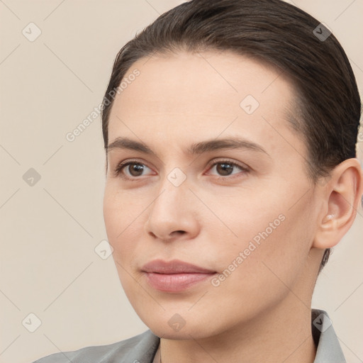 Neutral white young-adult female with short  brown hair and brown eyes