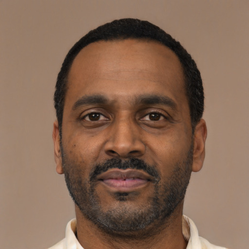 Neutral latino adult male with short  black hair and brown eyes