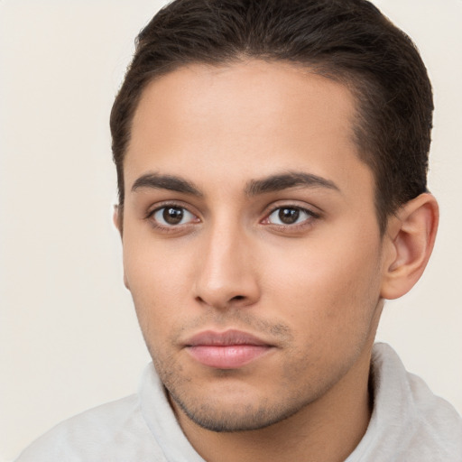 Neutral white young-adult male with short  brown hair and brown eyes