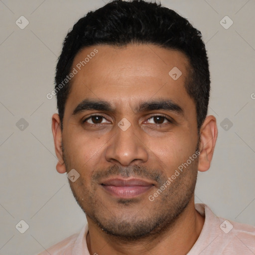 Joyful latino young-adult male with short  black hair and brown eyes