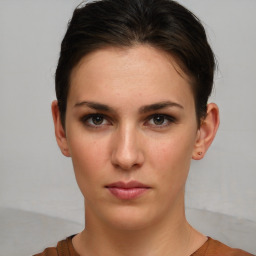 Neutral white young-adult female with short  brown hair and brown eyes