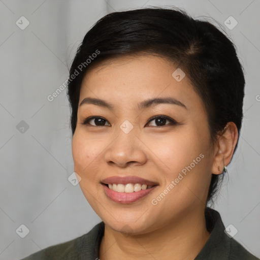 Joyful asian young-adult female with medium  brown hair and brown eyes