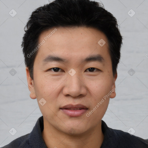 Joyful white young-adult male with short  black hair and brown eyes