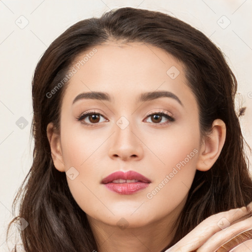 Neutral white young-adult female with long  brown hair and brown eyes