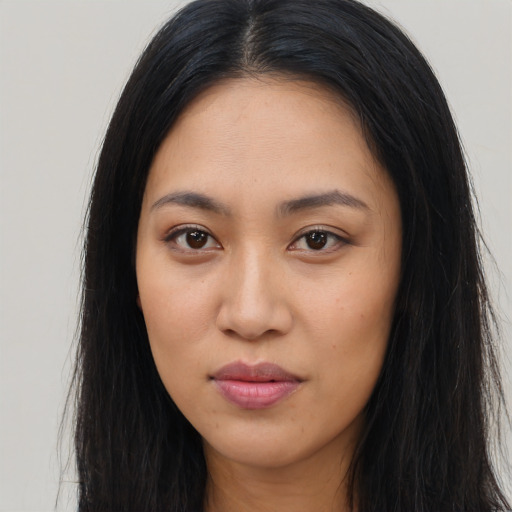 Neutral latino young-adult female with long  black hair and brown eyes