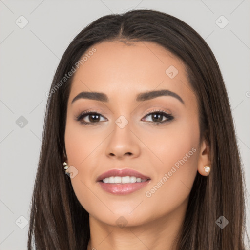 Joyful white young-adult female with long  black hair and brown eyes