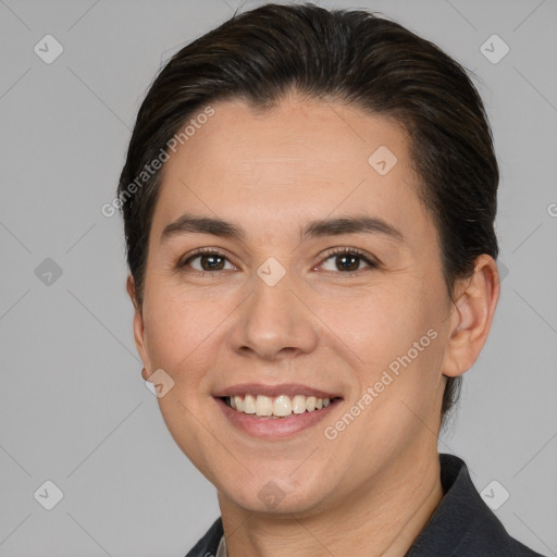 Joyful white young-adult female with short  brown hair and brown eyes