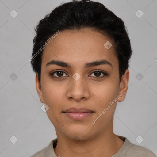 Joyful latino young-adult female with short  black hair and brown eyes