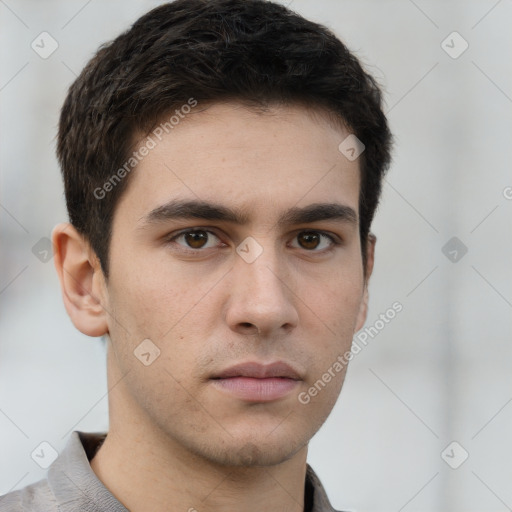 Neutral white young-adult male with short  brown hair and grey eyes