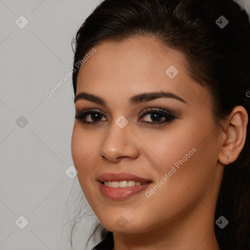 Joyful white young-adult female with long  brown hair and brown eyes