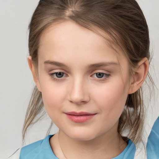 Joyful white child female with medium  brown hair and brown eyes