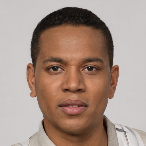 Neutral latino young-adult male with short  brown hair and brown eyes
