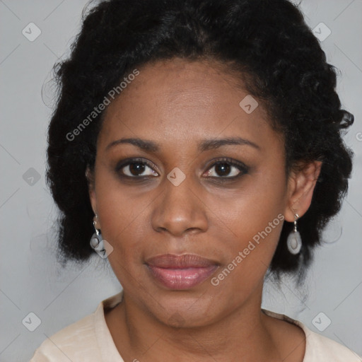 Joyful black young-adult female with medium  brown hair and brown eyes