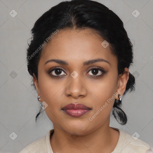 Joyful black young-adult female with medium  black hair and brown eyes