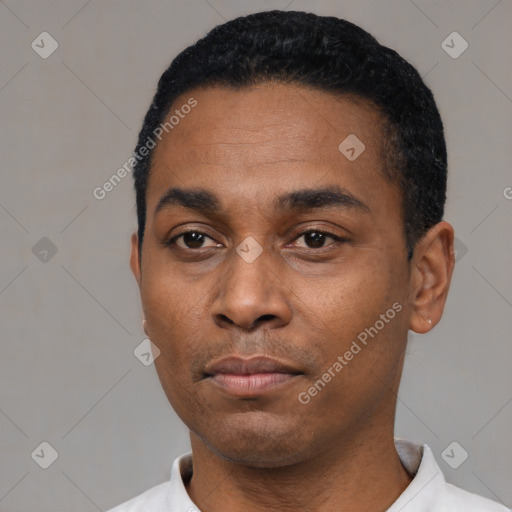 Neutral latino adult male with short  black hair and brown eyes