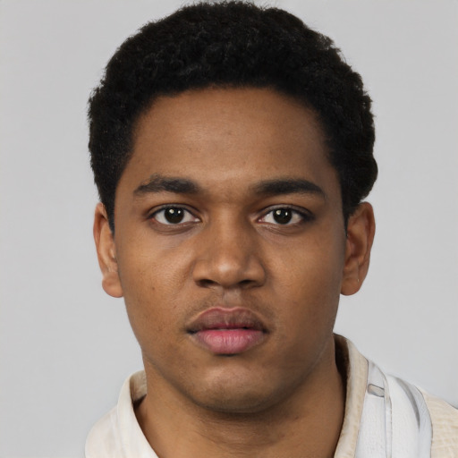 Neutral black young-adult male with short  black hair and brown eyes