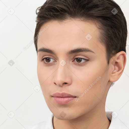 Neutral white young-adult male with short  brown hair and brown eyes