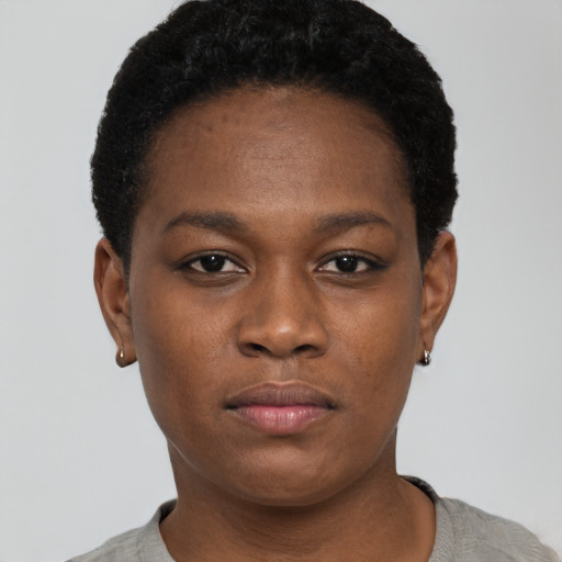 Neutral black young-adult female with short  black hair and brown eyes