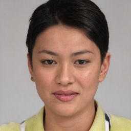 Joyful asian young-adult female with short  brown hair and brown eyes