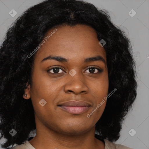 Joyful black young-adult female with medium  black hair and brown eyes