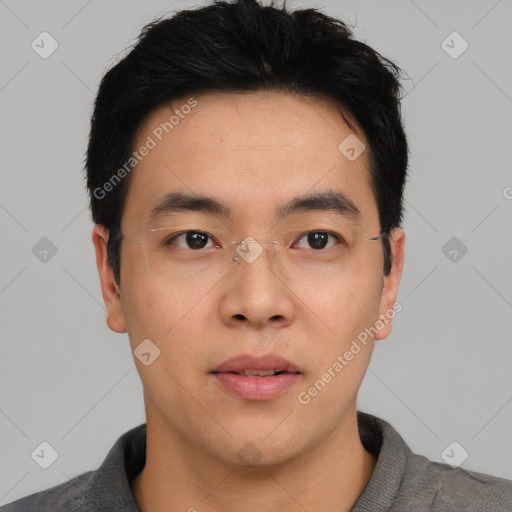 Neutral asian young-adult male with short  black hair and brown eyes