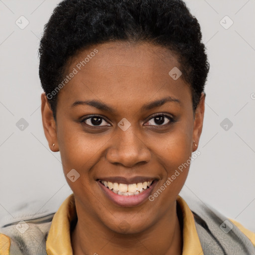 Joyful black young-adult female with short  brown hair and brown eyes