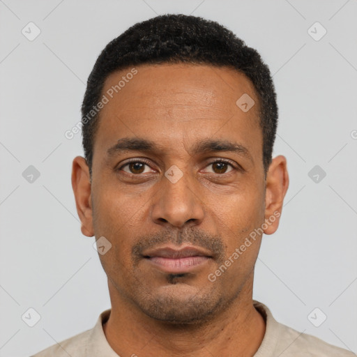 Neutral black young-adult male with short  black hair and brown eyes