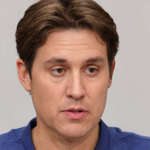 Neutral white adult male with short  brown hair and brown eyes