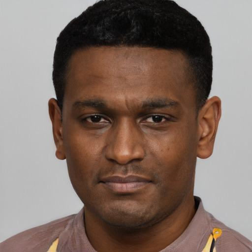Neutral black young-adult male with short  black hair and brown eyes