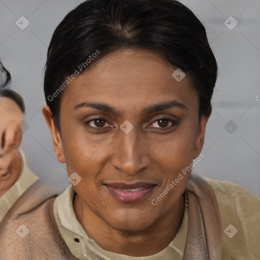 Joyful latino young-adult female with short  brown hair and brown eyes