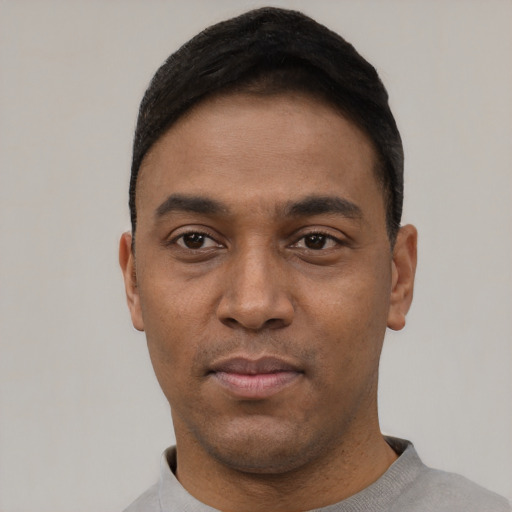 Neutral latino young-adult male with short  black hair and brown eyes