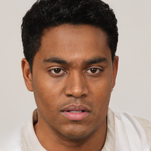 Neutral black young-adult male with short  brown hair and brown eyes