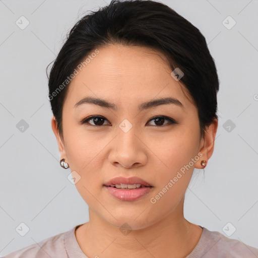 Joyful asian young-adult female with short  brown hair and brown eyes