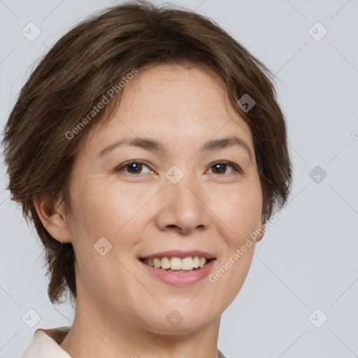 Joyful white adult female with medium  brown hair and brown eyes