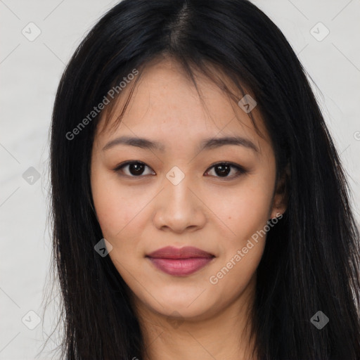 Joyful asian young-adult female with long  brown hair and brown eyes