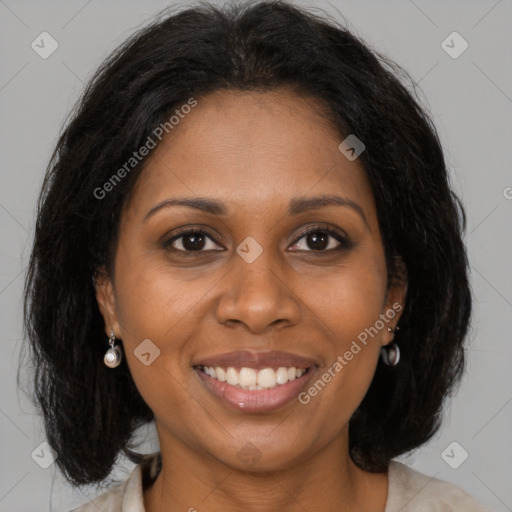 Joyful black young-adult female with medium  brown hair and brown eyes