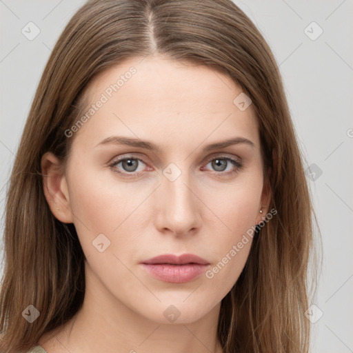 Neutral white young-adult female with long  brown hair and grey eyes