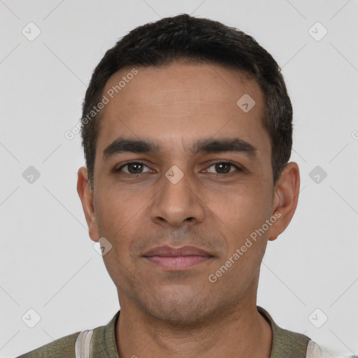 Neutral white young-adult male with short  black hair and brown eyes