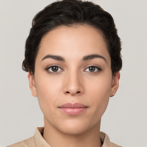 Neutral white young-adult female with short  brown hair and brown eyes