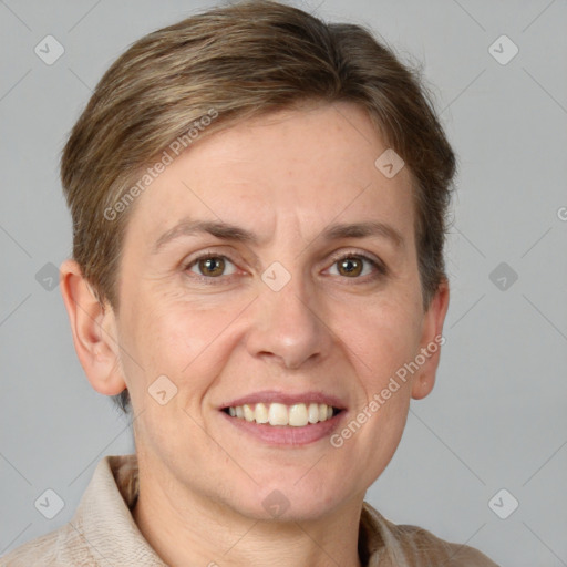 Joyful white adult female with short  brown hair and grey eyes