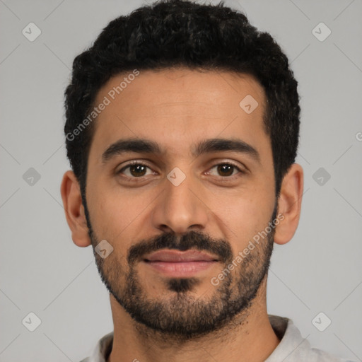 Joyful latino young-adult male with short  black hair and brown eyes