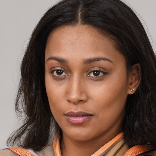 Neutral white young-adult female with long  brown hair and brown eyes