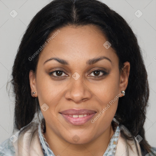 Joyful latino adult female with medium  brown hair and brown eyes