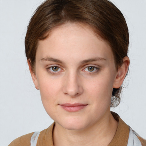 Neutral white young-adult female with medium  brown hair and grey eyes