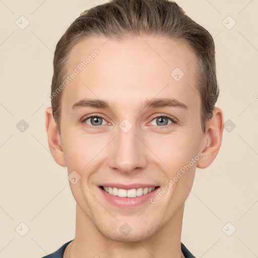 Joyful white young-adult female with short  brown hair and grey eyes