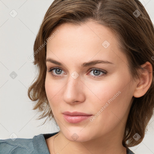 Neutral white young-adult female with medium  brown hair and grey eyes