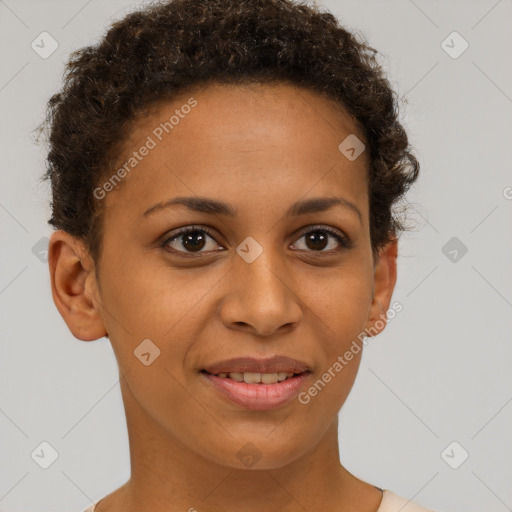 Joyful black young-adult female with short  brown hair and brown eyes