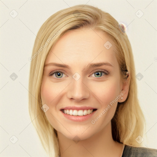 Joyful white young-adult female with long  brown hair and blue eyes