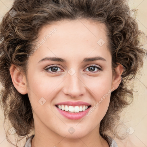 Joyful white young-adult female with medium  brown hair and green eyes