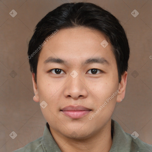 Joyful asian young-adult male with short  brown hair and brown eyes